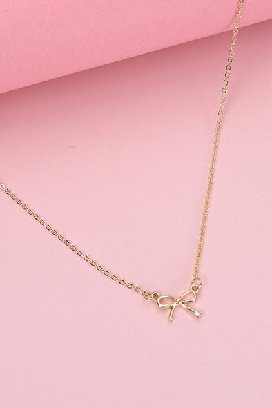 mini gold bow charm necklace