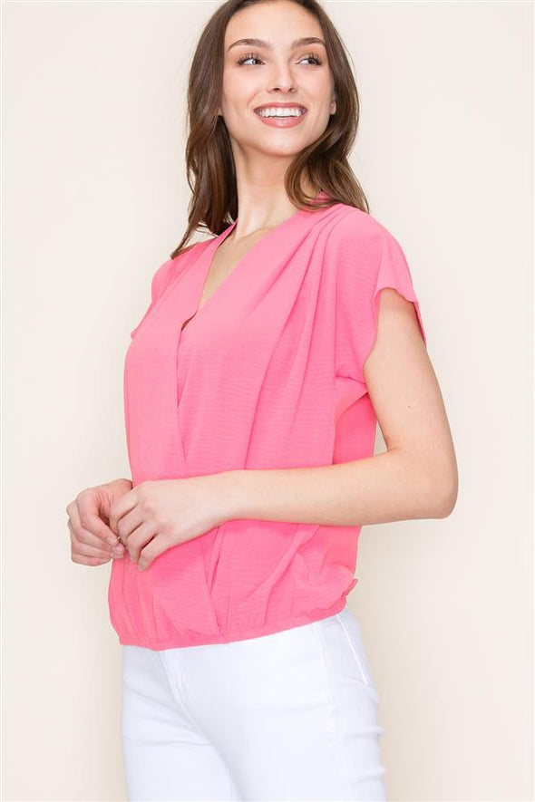 coral staccato wrap front elastic hem short sleeve blouse