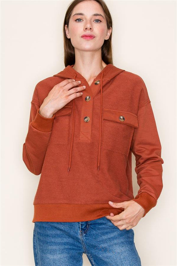 staccato rust hooded half placket button down chest pocket textured knit top