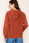 staccato rust hooded half placket button down chest pocket textured knit top