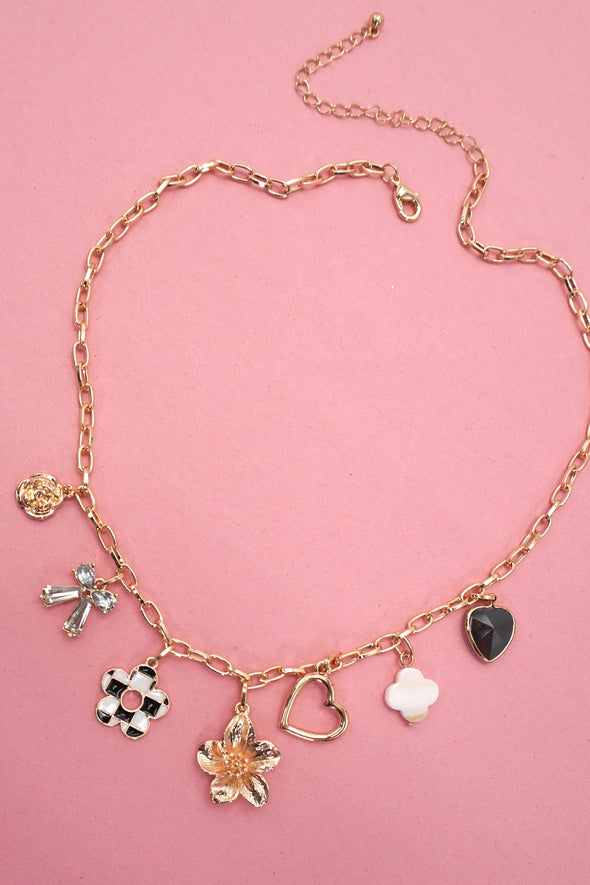 gold charm necklace flower heart checkered