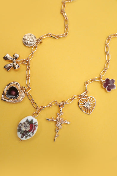 gold charm necklace cross heart flower charms