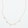 cross station charm necklace gold