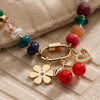 multi colored beaded charm bracelet cherry flower heart charm