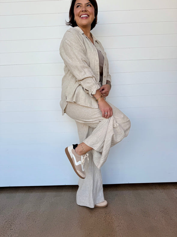 sneaker rubber sole lace up beige black white