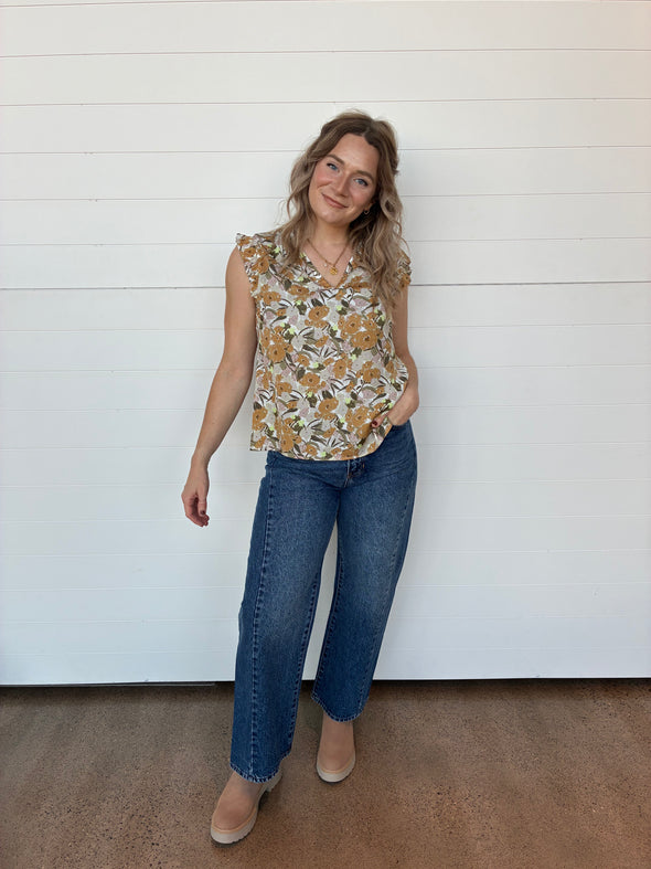 sleeveless v-neck floral printed blouse ruffle details