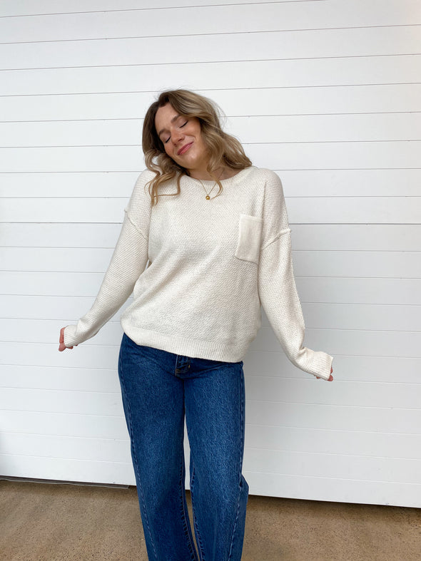 waffle knit crewneck chest pocket long sleeve off white sweater