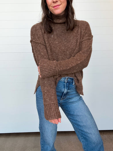 The Aspen Mock Neck Exposed Seam Sweater