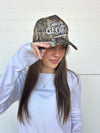 The 'Give God Glory' Camo Trucker Hat