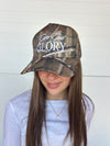 The 'Give God Glory' Camo Trucker Hat