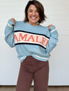 amalfi blue chunky knit long sleeve graphic sweater
