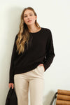 black crewneck sweater exposed seam details