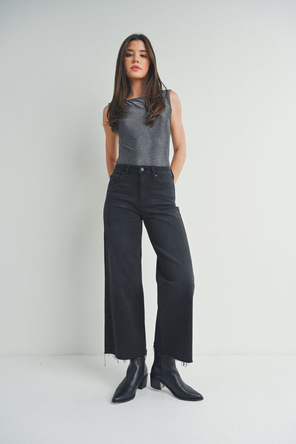 just black denim slim wide leg high rise ankle length raw scissor cut hem washed black denim jeans