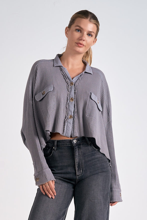 cropped waffle knit button up shacket exposed seams chest pockets dark grey