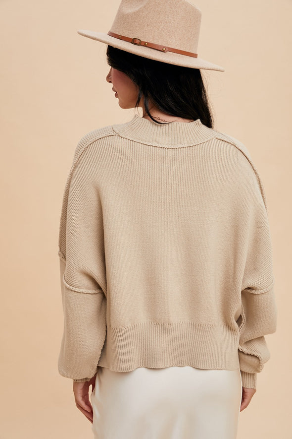 knit mock neck pullover sweater cropped exposed seams balloon sleeve side slit oversized relax fit oatmeal