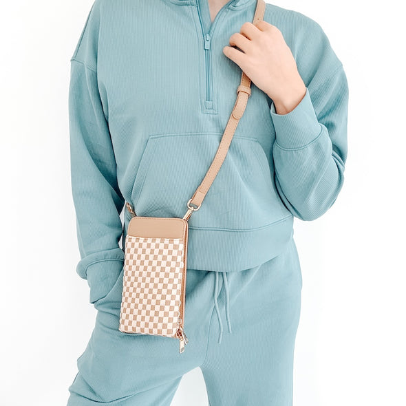 pretty simple woven double duty phone bag checkered tan