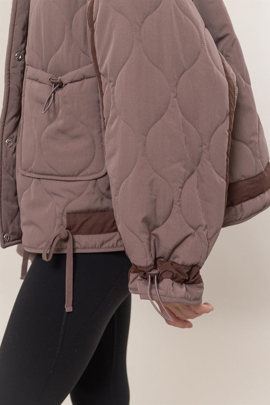 quilted toggle puffer jacket drawstring details zip front oversized fit brown umber fall winter